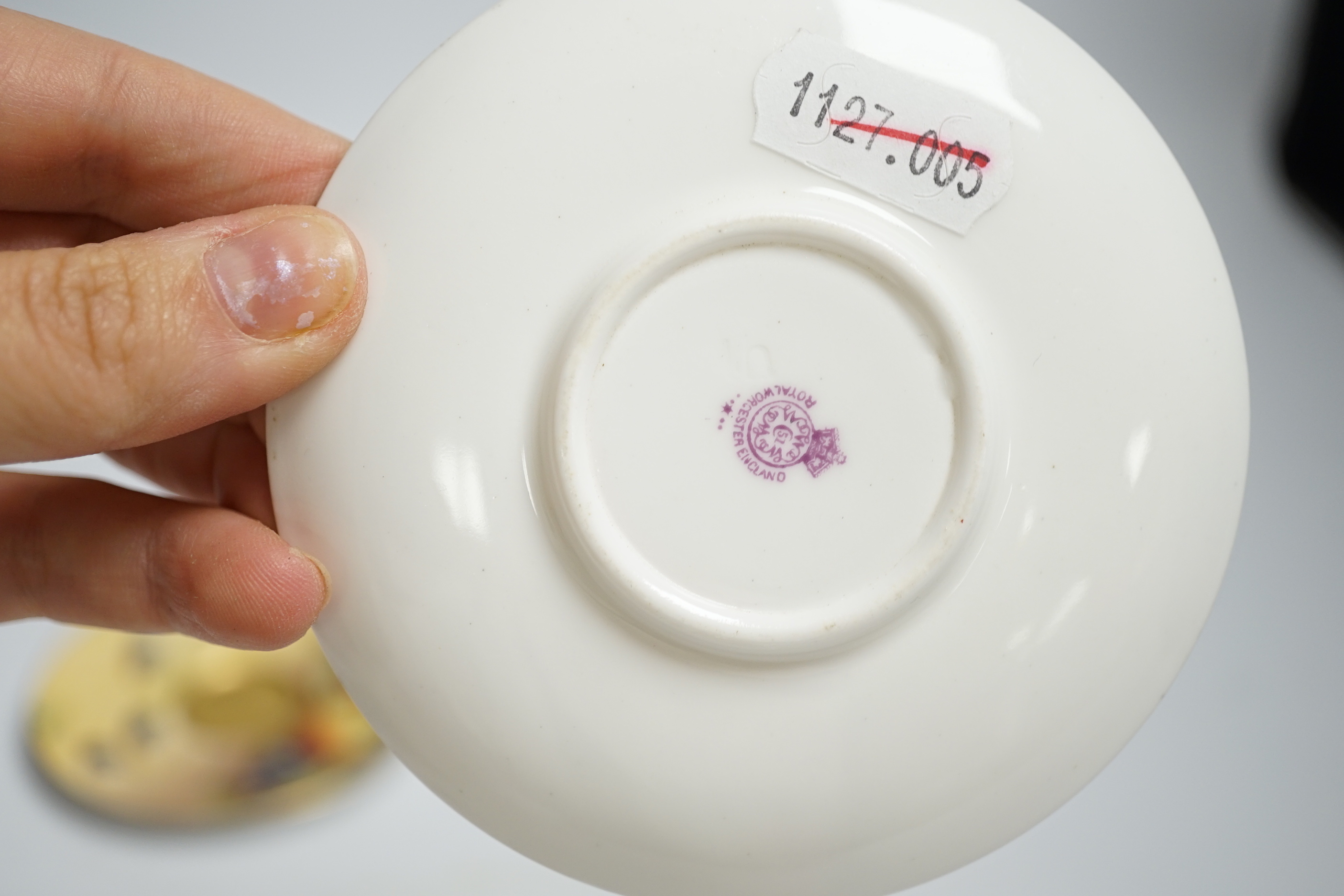 A pair of Royal Worcester fruit painted miniature cabinet cups and saucers, signed F. Harper and W.H. Austin
